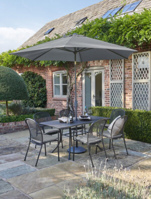 C0601-0200-7C940-T0475-0200S-PW25-930-Caredo-6-seater-set-slate-with-parasol-LIFESTYLE